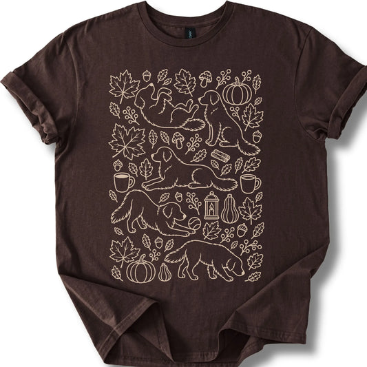 Golden Retriever among autumn leaves and seasonal icons on a dark chocolate T-shirt.