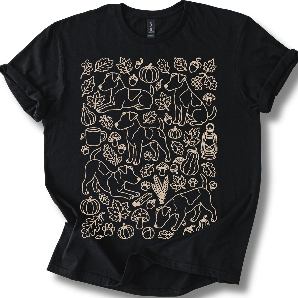 Jack Russell among autumn leaves and seasonal icons on a black T-shirt.
