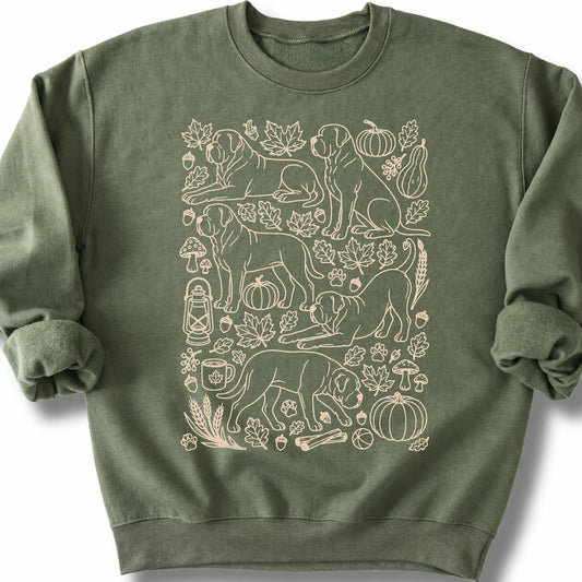 Mastiff among autumn leaves and seasonal icons on a military green sweatshirt.