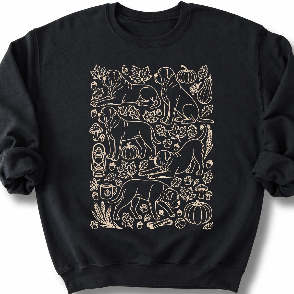 Mastiff among autumn leaves and seasonal icons on a black sweatshirt.