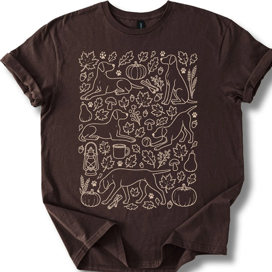 Pointer among autumn leaves and seasonal icons on a dark chocolate T-shirt.