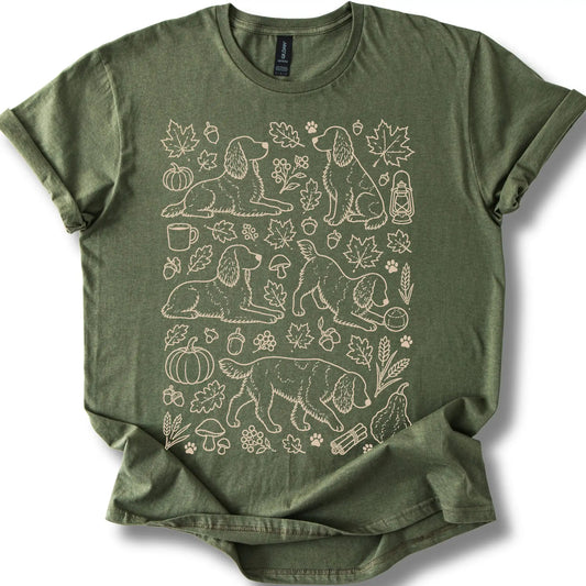 Springer Spaniel among autumn leaves and seasonal icons on a military green T-shirt.