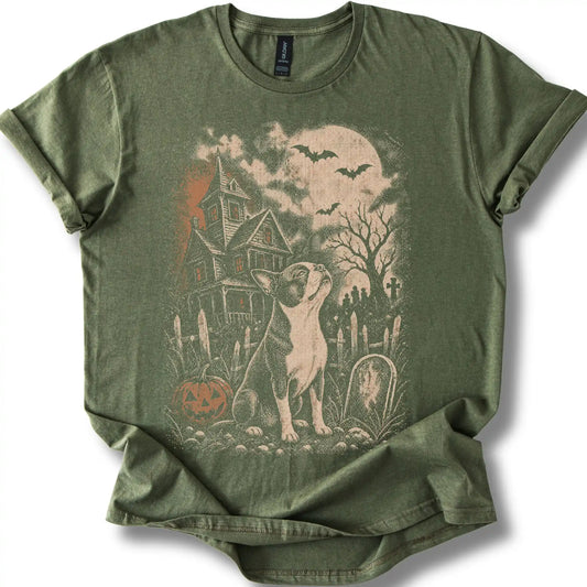 Boston Terrier beside a haunted house on a military green T-shirt.