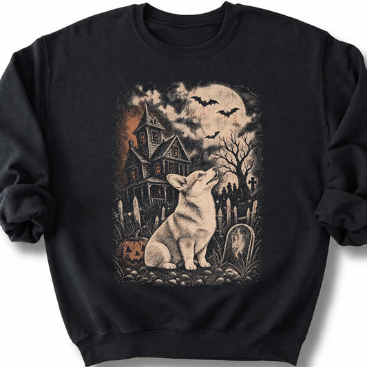 Corgi beside a haunted house on a black sweatshirt.