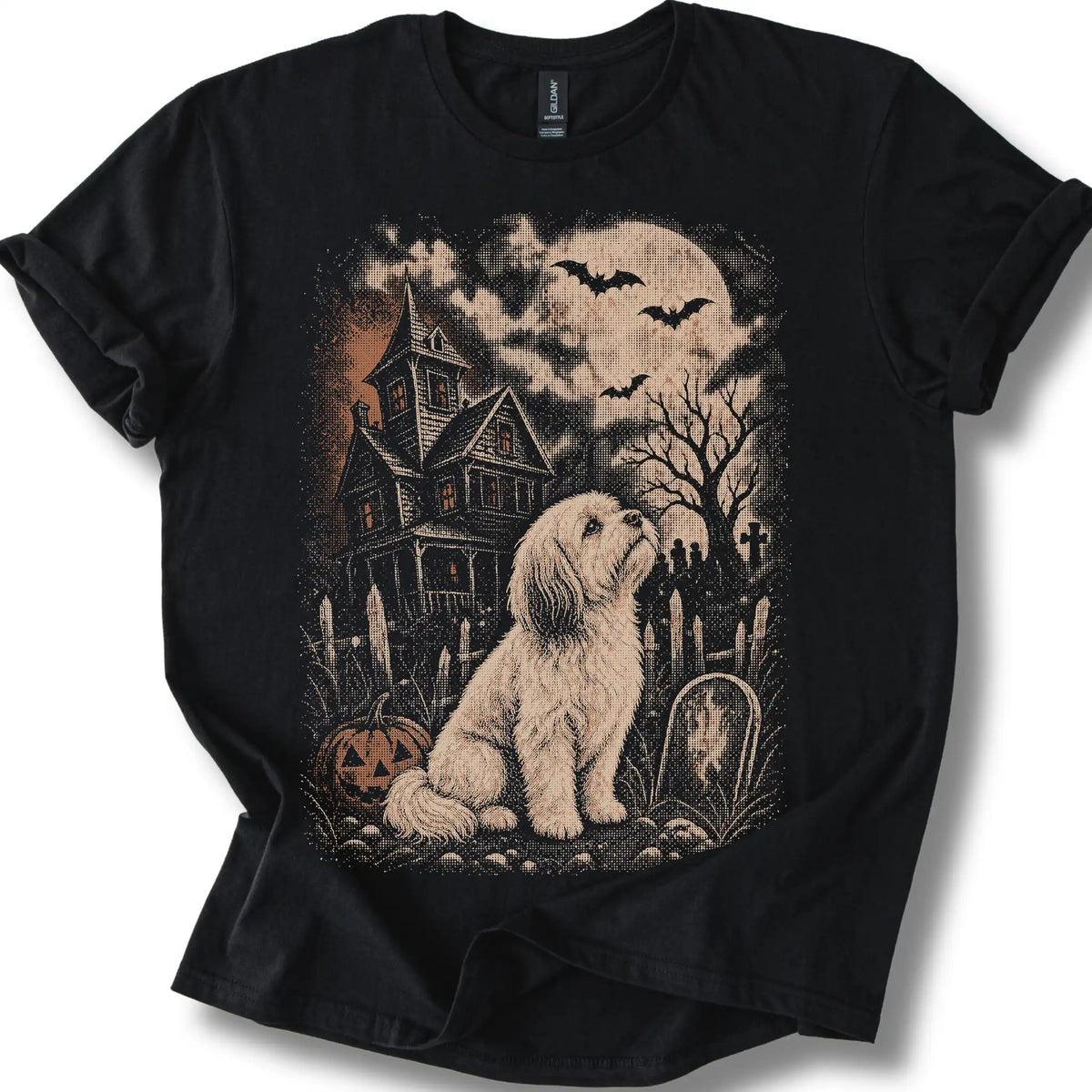Havanese beside a haunted house on a black T-shirt.