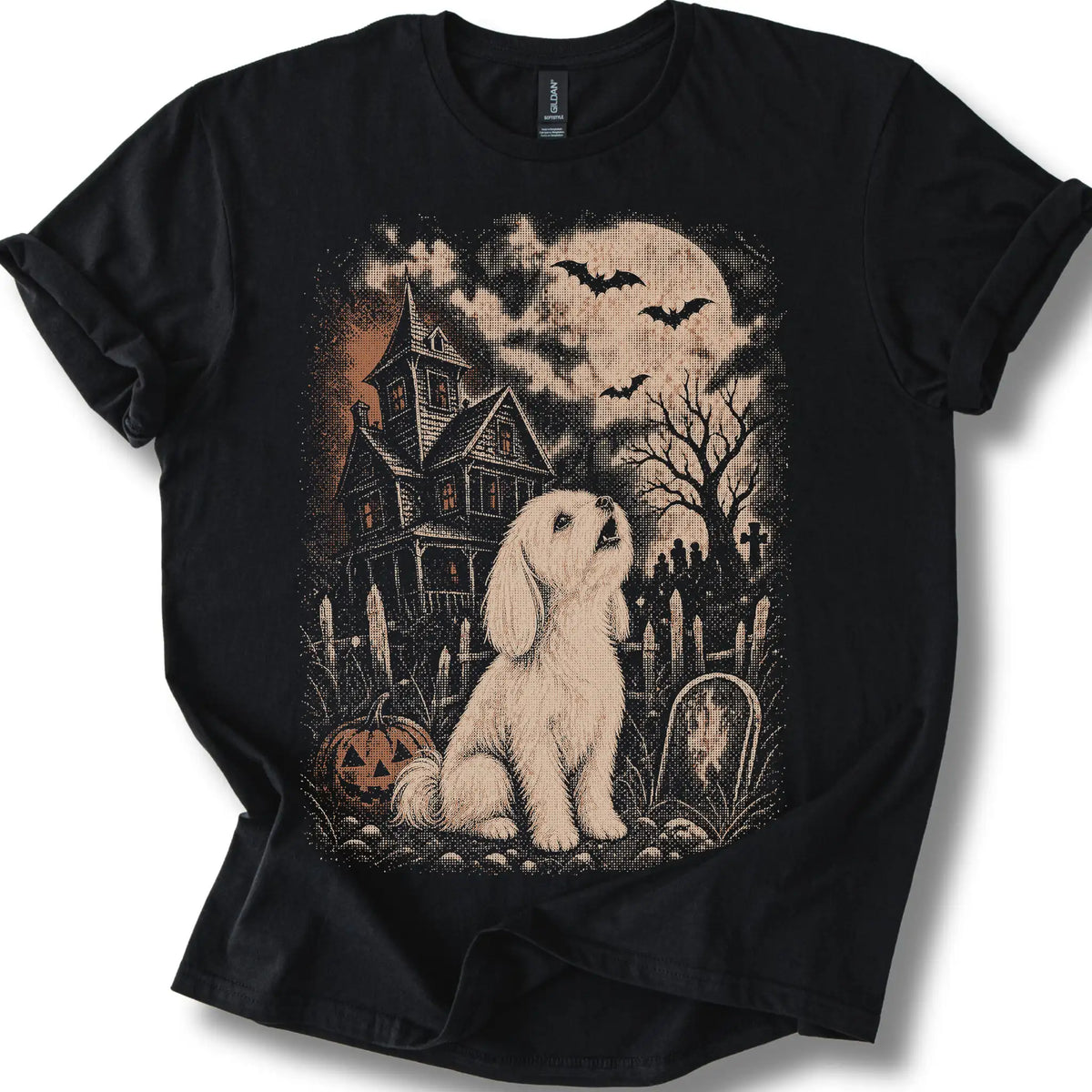 Maltese beside a haunted house on a black T-shirt.