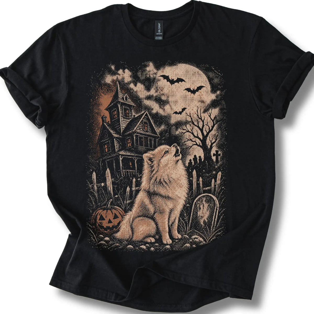 Pomeranian beside a haunted house on a black T-shirt.
