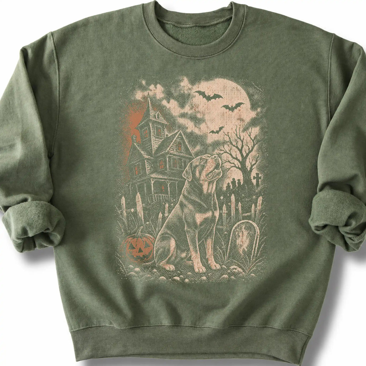Rottweiler beside a haunted house on a military green sweatshirt.