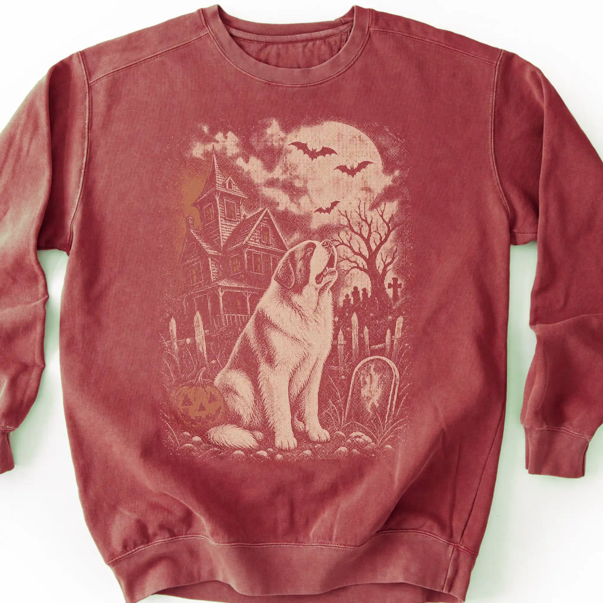 Saint Bernard beside a haunted house on a crimson sweatshirt.