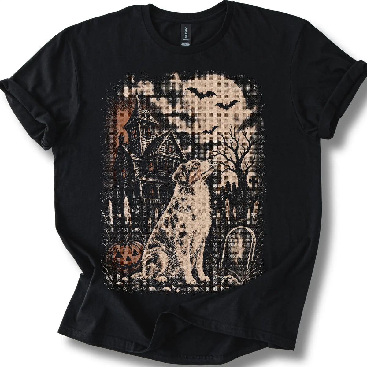Australian Shepherd beside a haunted house on a black T-shirt.