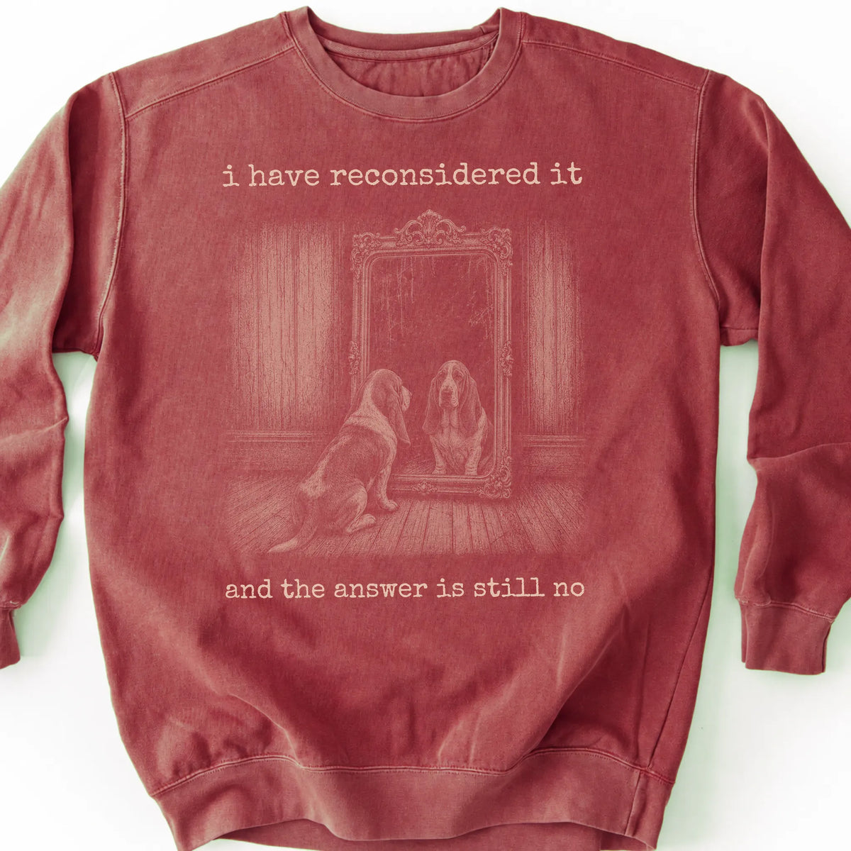 Basset Hound The Answer Is Still No on a Crimson crewneck sweatshirt, shown flat