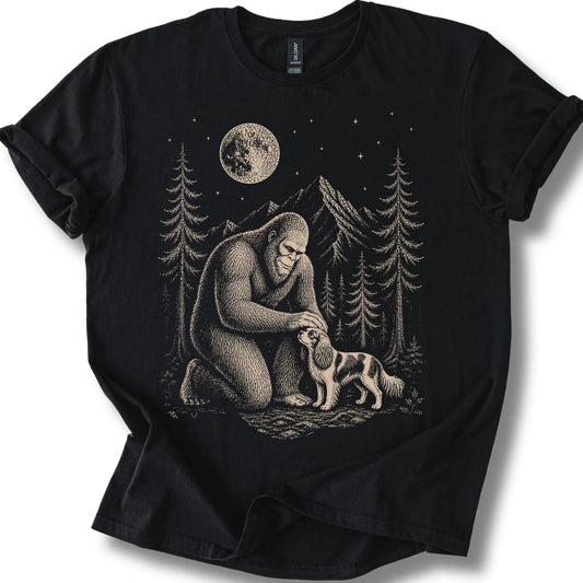 Cavalier King Charles Spaniel Bigfoot Petting on a Black T-shirt, shown flat