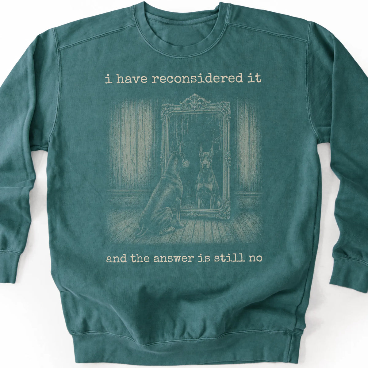 Doberman The Answer Is Still No on a Blue Spruce crewneck sweatshirt, shown flat