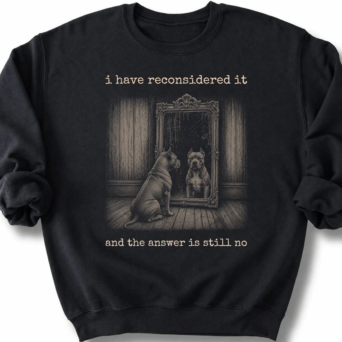 Pitbull The Answer Is Still No on a Black crewneck sweatshirt, shown flat