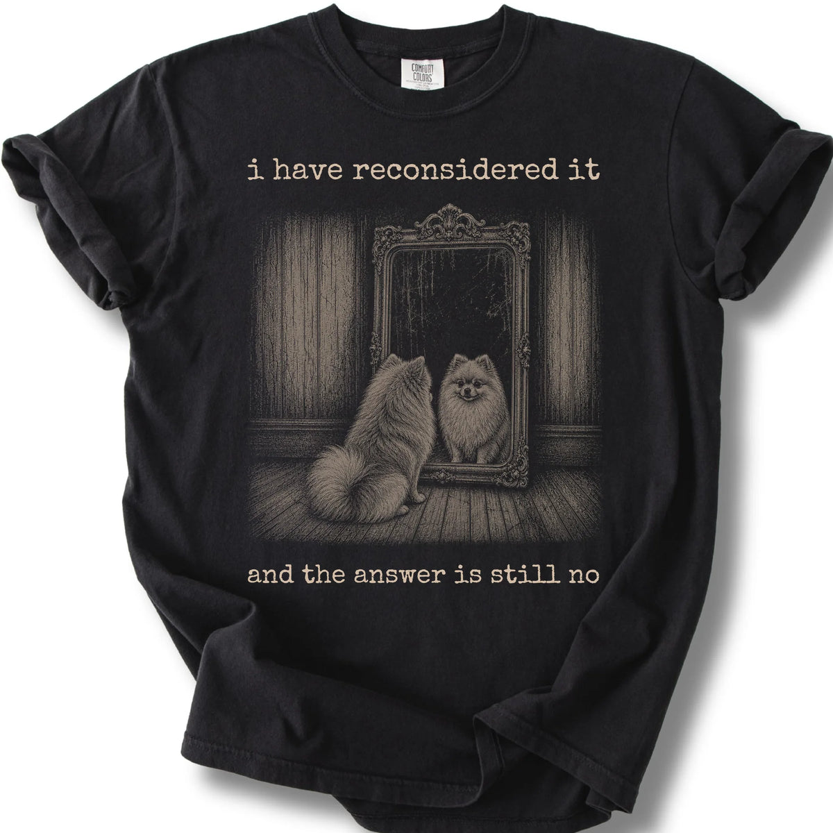Antisocial Pomeranian design on a Black Comfort Colors T-shirt, shown flat