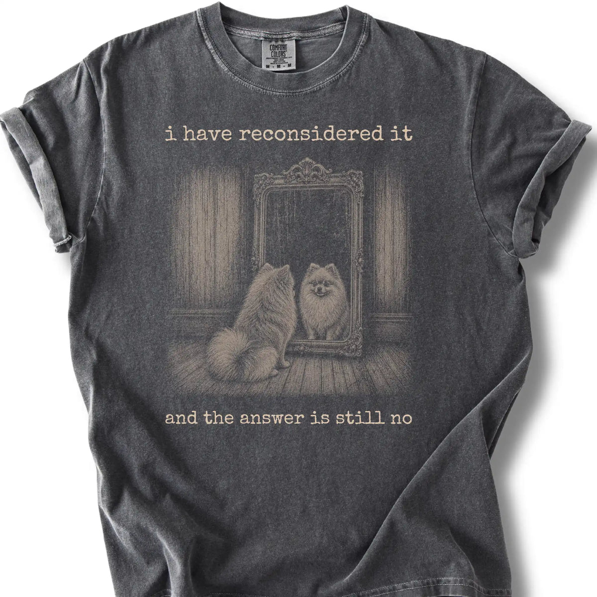 Antisocial Pomeranian design on a Pepper Comfort Colors T-shirt, shown flat