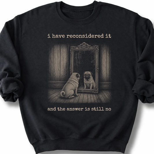 Pug The Answer Is Still No on a Black crewneck sweatshirt, shown flat