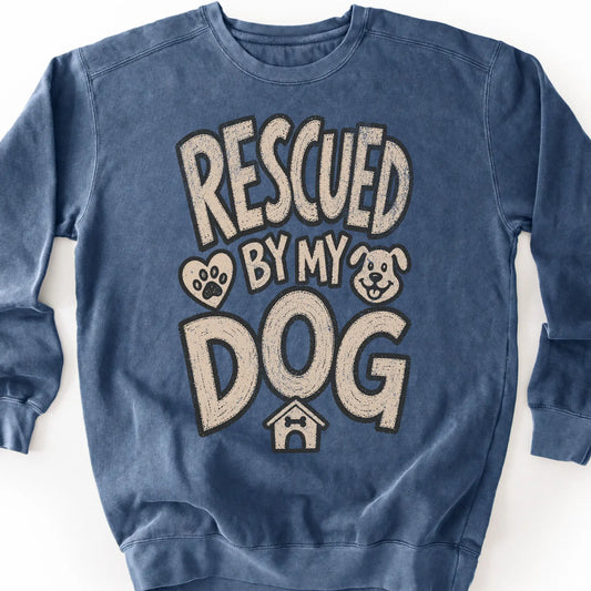Rescued by my dog on a Denim crewneck sweatshirt, shown flat