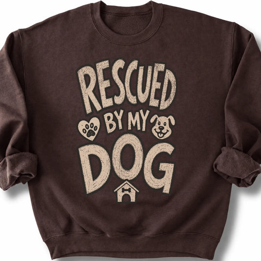 Rescued by my dog on a Dark Chocolate crewneck sweatshirt, shown flat