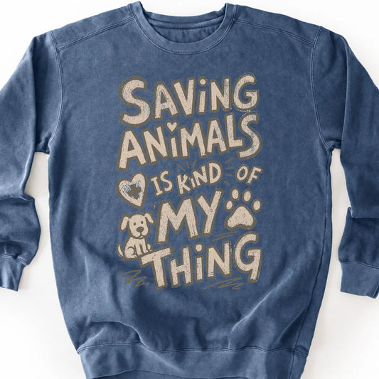 Saving Animals is kind of my thing on a Denim crewneck sweatshirt, shown flat