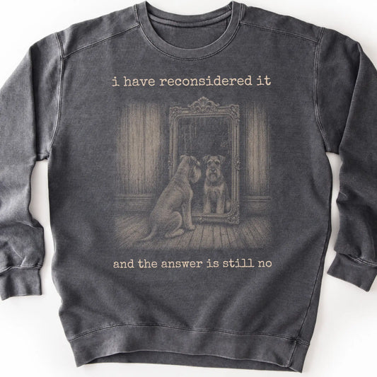 Schnauzer The Answer Is Still No on a Pepper crewneck sweatshirt, shown flat